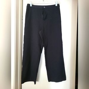 Cropped, flared black slacks